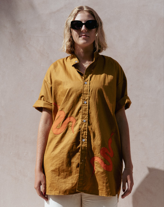 NYOKA shirt (olive green + orange snakes)