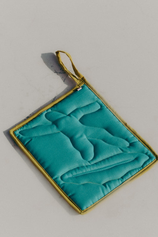 MOTO hot plate rest (turquoise Surfer dude)